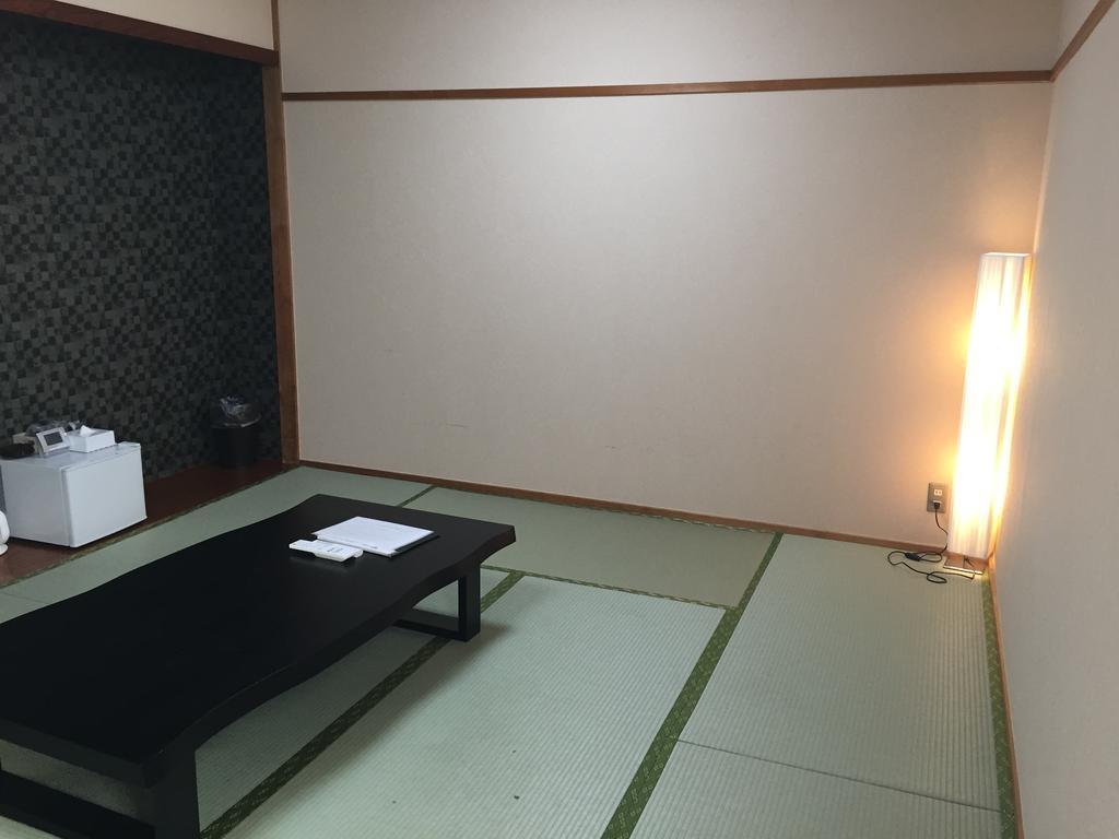 Tokyo Banyan Hotel Quarto foto